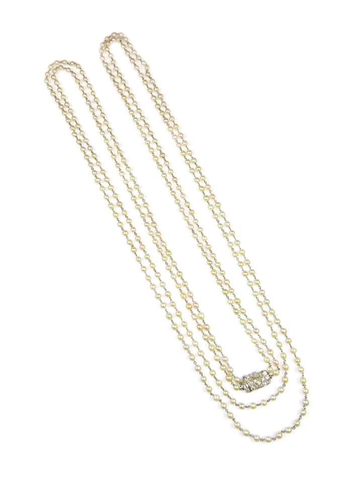 Early 20th century two row pearl necklace on a diamond panel clasp